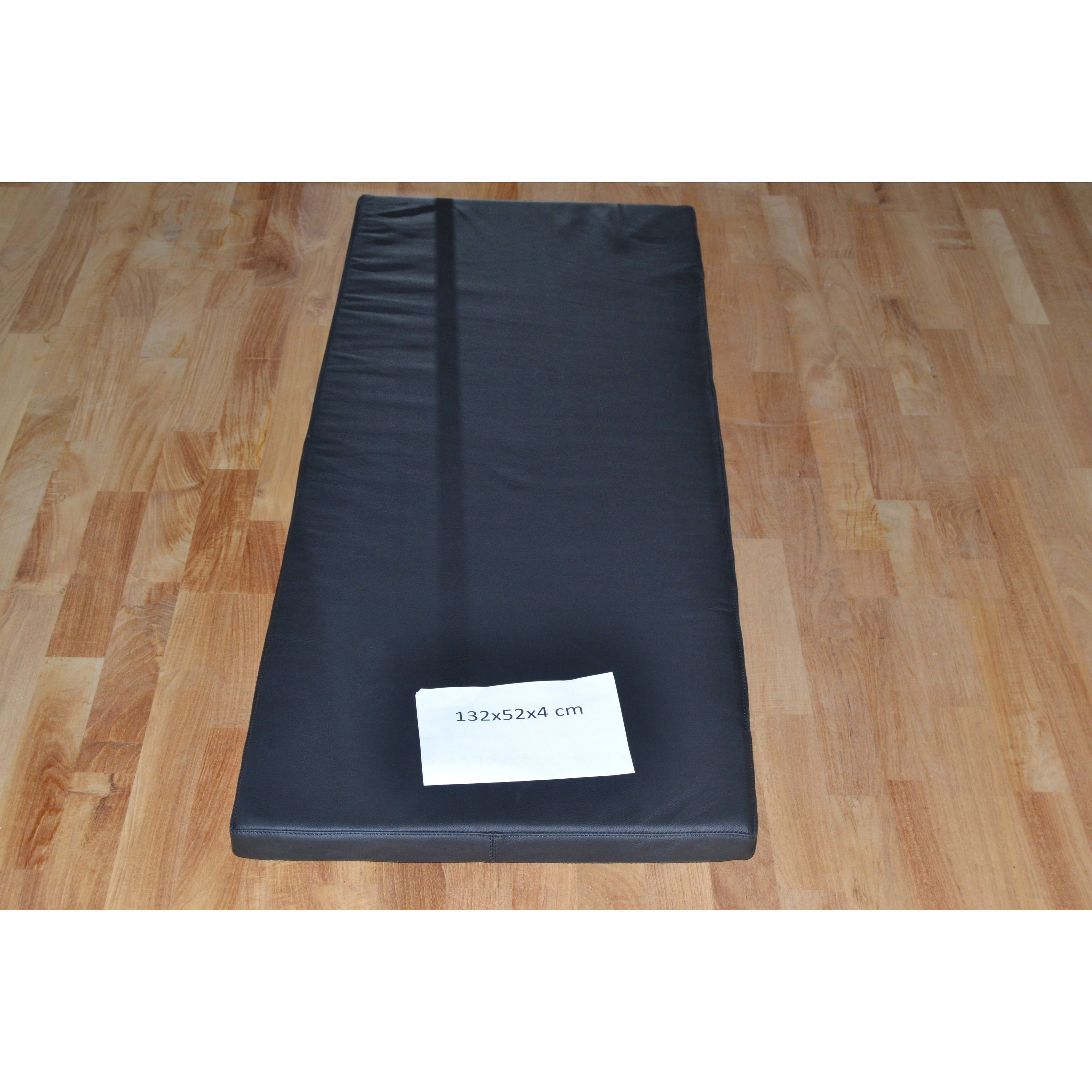 Svart skinnpute 132x52x4 cm